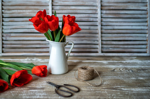 Spring flowers. Tulips flowers on rustic wooden background. Copy space. - Zdjęcie, obraz