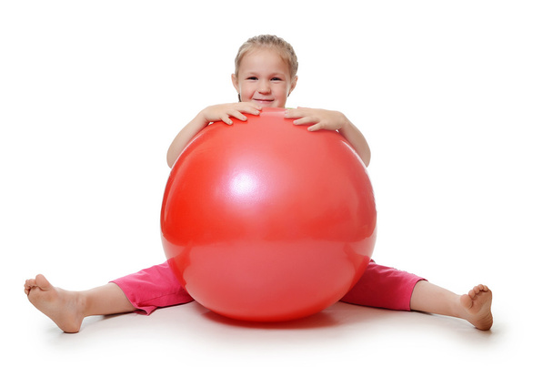 Little girl with a gymnastic ball - Φωτογραφία, εικόνα