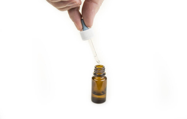Бутылка капель из носа для холодного лечения
 - Фото, изображение