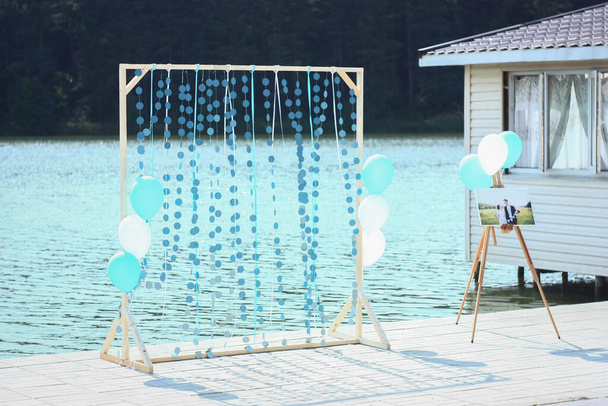 wedding photo zone on the lake with balloons - Photo, Image
