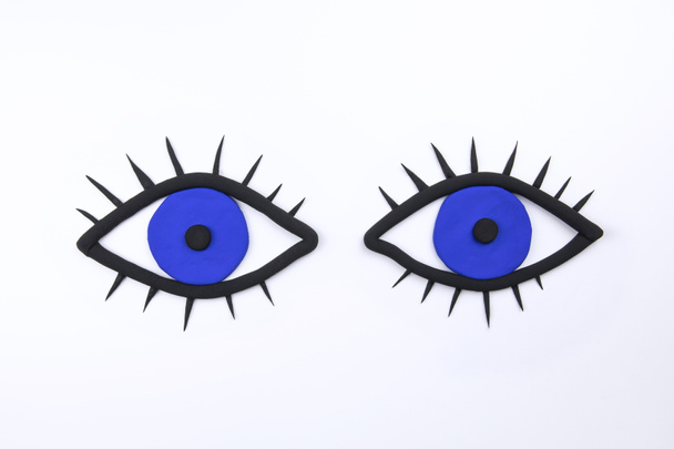 Ζευγάρι μπλε ματιών με βλεφαρίδες σε λευκό φόντο. Σχέδιο Observig. Επίπεδη παραλλαγή. Οφθαλμικό υπόβαθρο. - Φωτογραφία, εικόνα