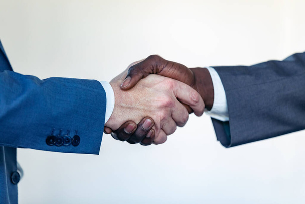 Close-up view of business partner handshaking process. Successful deal concept after great meeting. - Foto, Imagen