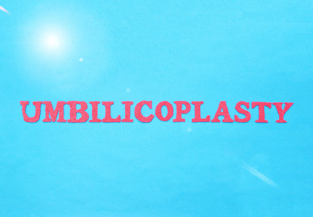 The word umbilicoplasty in red letters on a blue background. The concept of plastic surgery to change the shape and size of the navel in a person, a modern procedure - Photo, Image
