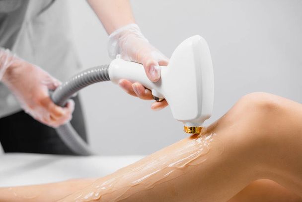 close-up photo of female getting laser hair removal procedure - Fotoğraf, Görsel