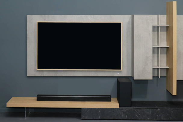 Large television screen on the wall of modern interior - Fotó, kép