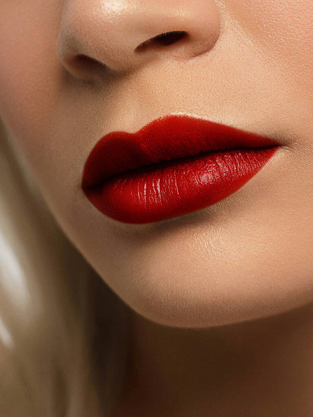 Closeup plump Lips. Lip Care, Augmentation, Fillers. Macro photo with Face detail. Natural shape with perfect contour. Close-up perfect lip makeup beautiful female mouth. Plump sexy full red lips - 写真・画像