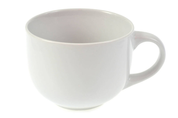 Prázdný bílý pohár zavřít na bílém pozadí  - Fotografie, Obrázek
