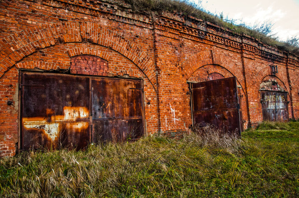 KAUNAS, LITHUANIA - NOVEMBER 17, 2013: Tragic place on the territory of which there was a concentration camp during the war. Abandoned Fort in the city of Kaunas - 写真・画像