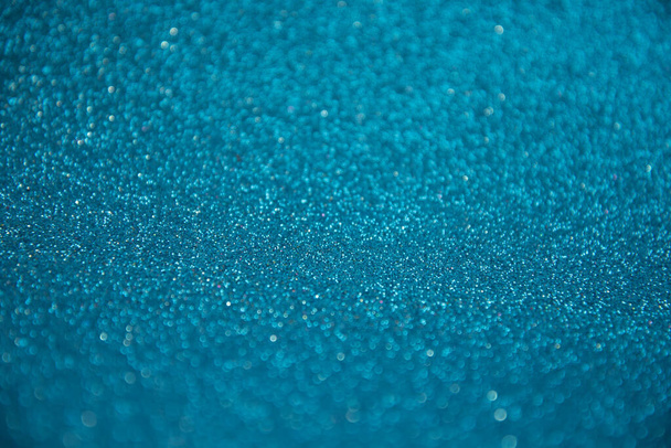 Blue background with sequins for a postcard. new year Christmas and other - Photo, image
