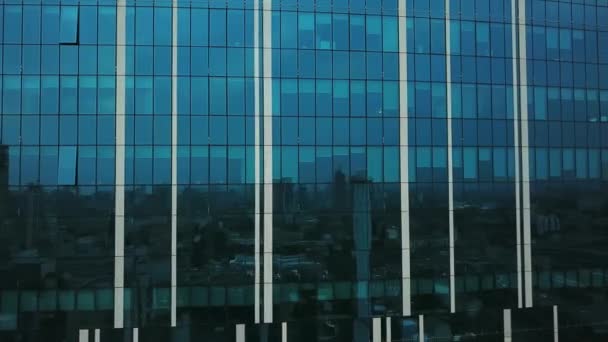 Aerial view of close-up of a skyscraper, Business building close up Aerial, Flight near a glass skyscraper, Impressive skyscrapers from drone - Imágenes, Vídeo
