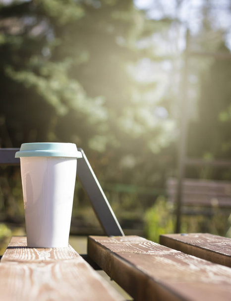 Reusable cup, natural morning background. Zero waste concept. Eco-friendly cup for take away drinks. - Foto, Imagem
