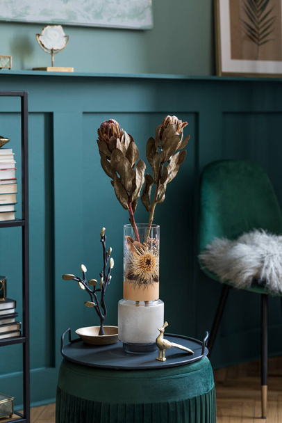 Flowers in stylish vase on cabinet, interior design - Foto, imagen