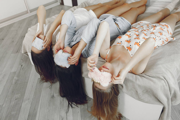 Three girls have pajamas party at home - Фото, зображення
