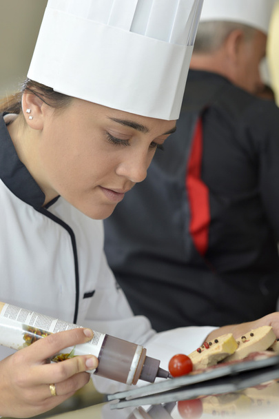 Caterer preparing foire gras dish - Фото, изображение