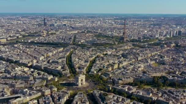 PARIS, FRANCE - MAY, 2019: Aerial drone view of Triumphal Arch and and Eiffel tower in historical city centre. - Záběry, video
