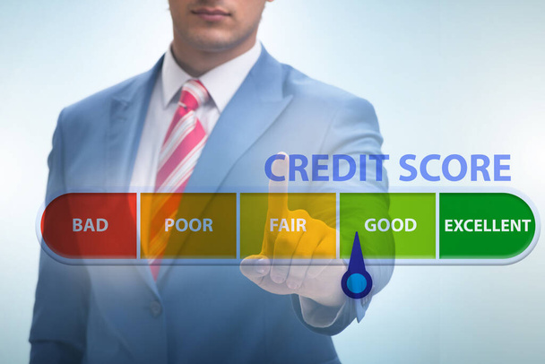 Empresário no conceito de pontuação de crédito
 - Foto, Imagem