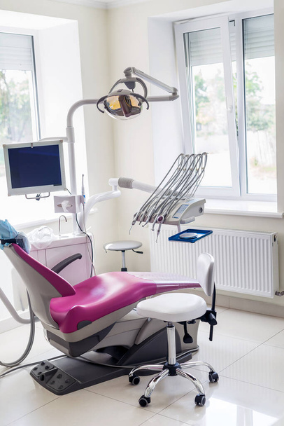 Modern patient chair and equipment in dentistry office - Zdjęcie, obraz