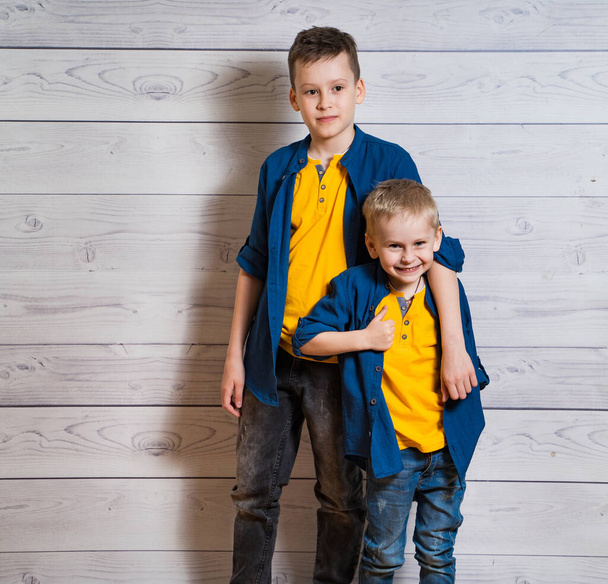 Studio portrait of two boys. Happy childhood concept. - Foto, Bild