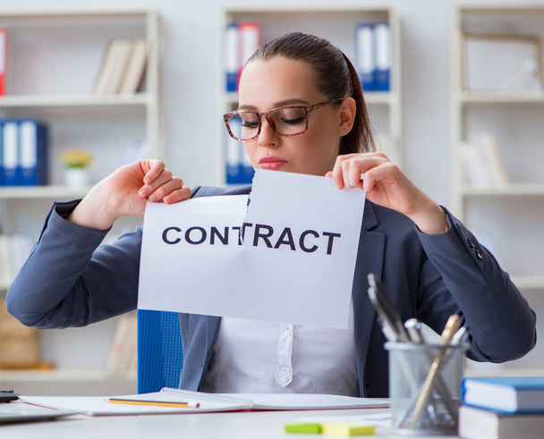 Businesswoman tearing apart her contract - Photo, Image
