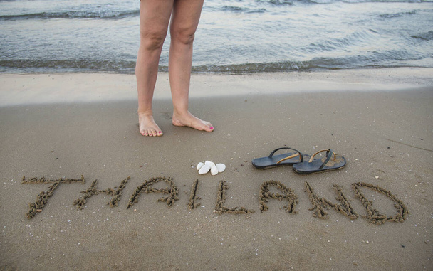 Tailândia escrito na areia na praia
. - Foto, Imagem