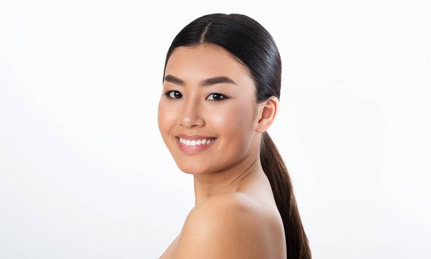 Portrait Of Asian Girl With Natural Makeup On White Background - Fotografie, Obrázek