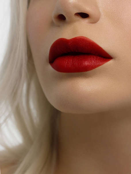 Closeup plump Lips. Lip Care, Augmentation, Fillers. Macro photo with Face detail. Natural shape with perfect contour. Close-up perfect lip makeup beautiful female mouth. Plump sexy full red lips - Foto, afbeelding