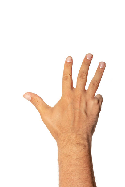 Рука показывает четыре пальца. Рука запястье с номером 4
 - Фото, изображение