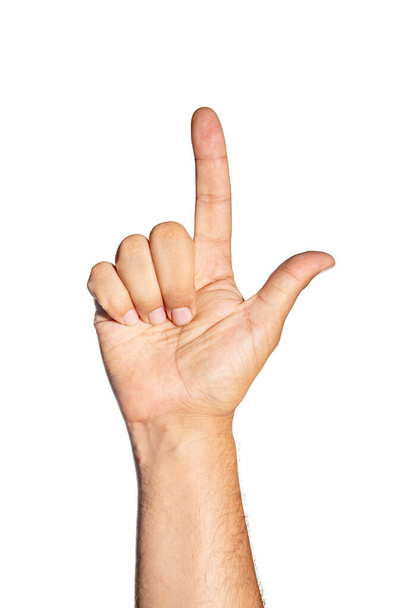 Людська рука з вказівкою пальця на щось. Кнопка інтерфейсу або натискання
. - Фото, зображення