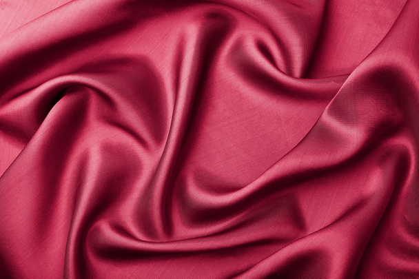 Abstrakti punainen silkki tausta
 - Valokuva, kuva