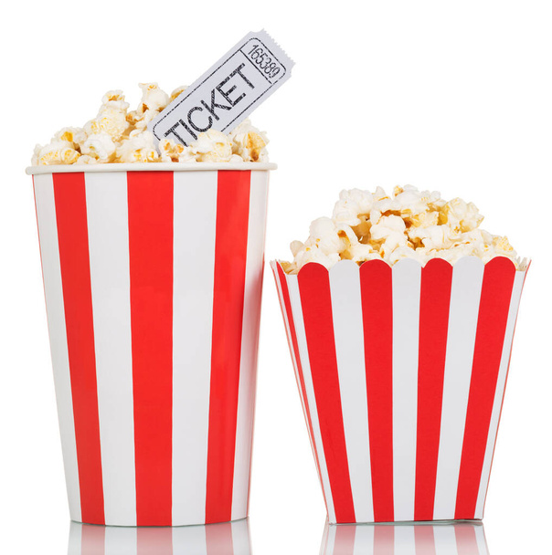 Two striped box with popcorn and movie tickets isolated on white background - Zdjęcie, obraz