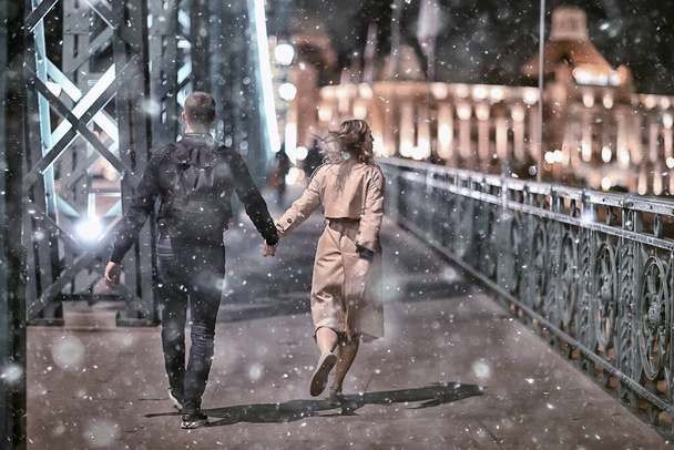 couple in love winter Budapest, tourism Hungary, a young couple a walk around the city in the evening - Zdjęcie, obraz