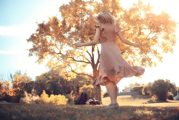happy woman in autumn look, young girl outside in autumn mood - 写真・画像