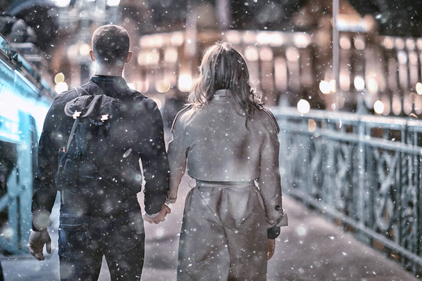 couple in love winter Budapest, tourism Hungary, a young couple a walk around the city in the evening - Fotoğraf, Görsel