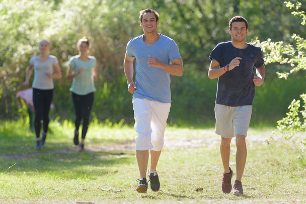 people doing jogging in the park path - Foto, Imagen