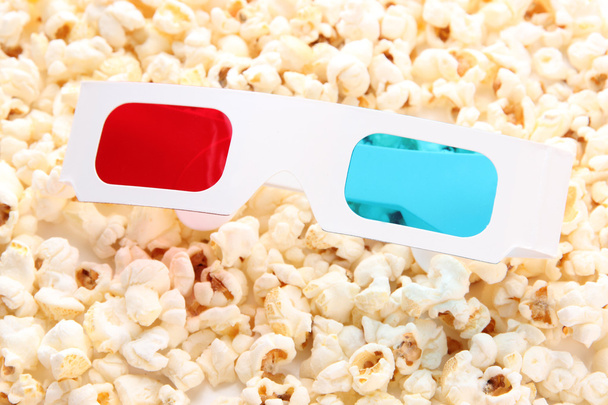 3D glasses on popcorn background - Фото, зображення