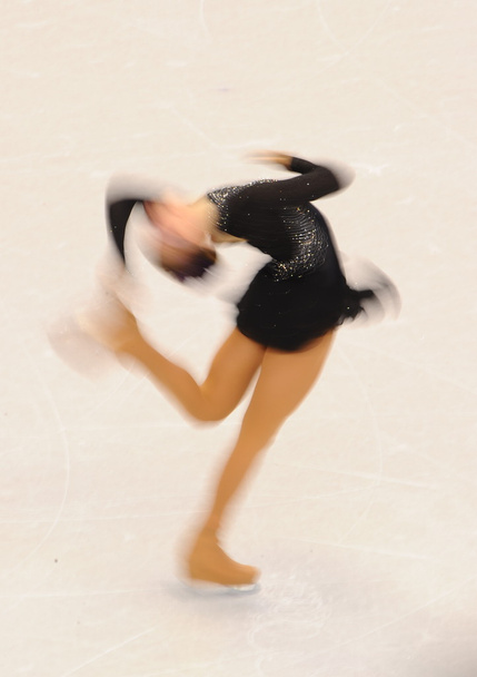 női ice-skater akcióban - Fotó, kép
