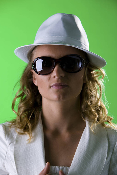 Woman with white suit and hat II - Фото, зображення