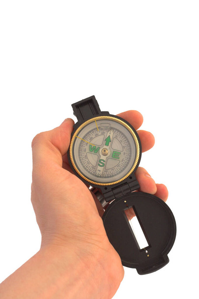 ruka drží kompas izolované na bílém pozadí - Fotografie, Obrázek