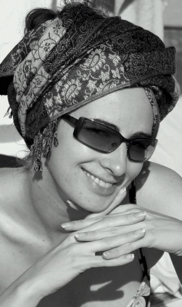 Portrait of a woman wearing a headscarf - Фото, изображение