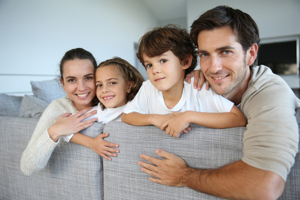 Family relaxing in sofa - Photo, Image