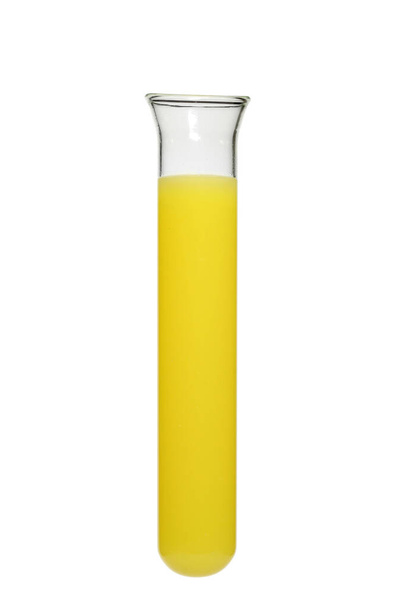 test tube with yellow liquid isolated on white background - Fotó, kép