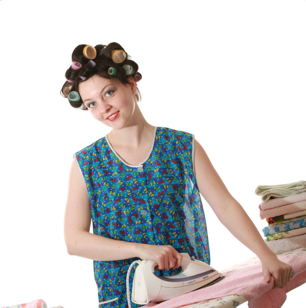 young housewife ironing clothes on the white background - Foto, Bild