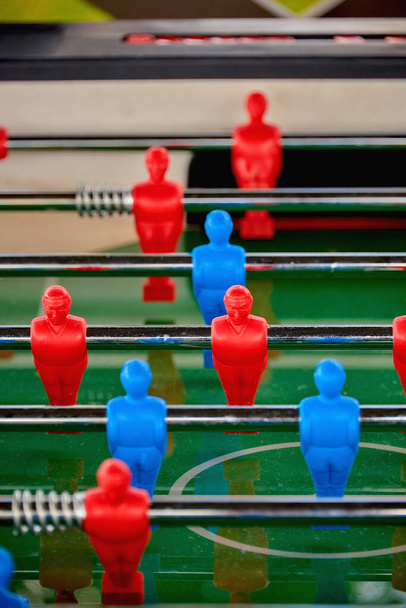 Table football, table football with a close-up of red and blue players. - Zdjęcie, obraz