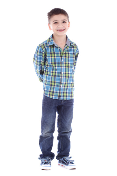Full length portrait of smiling little boy in jeans on white background - Photo, Image