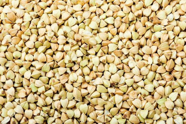 Raw green buckwheat background or vegan food.Food background,macro - Foto, imagen