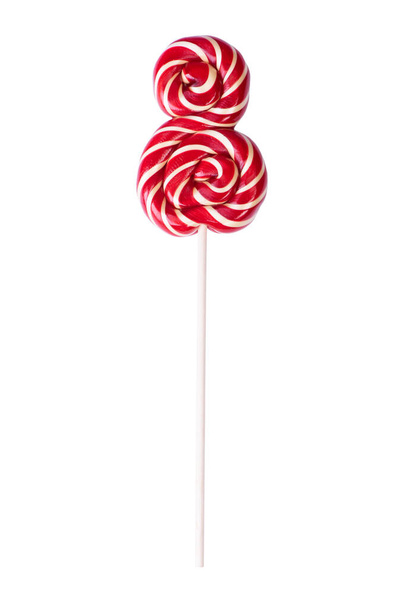 Hermosa paleta de caramelo lollipop aislado sobre fondo blanco
 - Foto, imagen