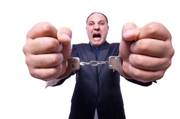 Businessman with handcuffs on white - Photo, Image