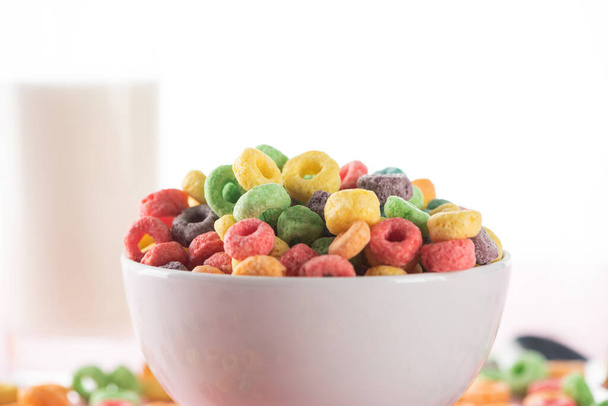 selective focus of bright multicolored breakfast cereal in bowl - Photo, image