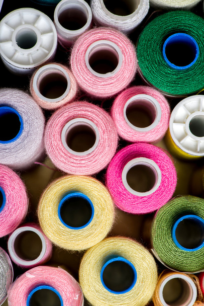 Colorful reels of threads background - Photo, Image