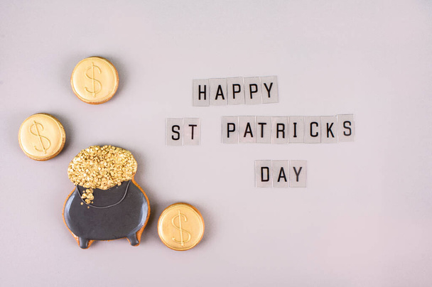 March 17 is St. Patricks Day. Composition of sweet gingerbread on a light background. - Photo, image